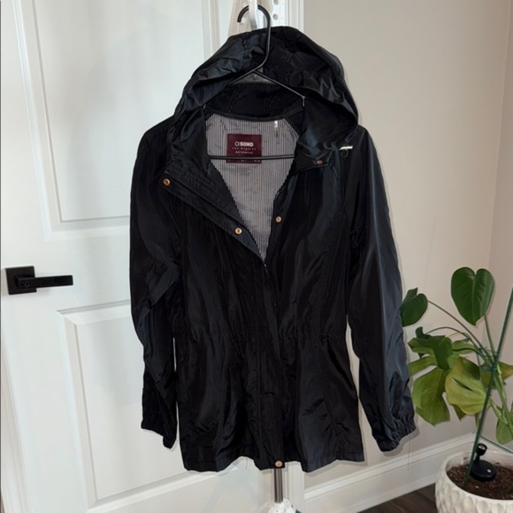 Women’s long black adjustable wind breaker size small